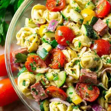 Italian Tortellini Pasta Salad Recipe A 1200x1200 square photo of Italian Tortellini Pasta Salad. 4.8 Stars (48 Reviews) Print