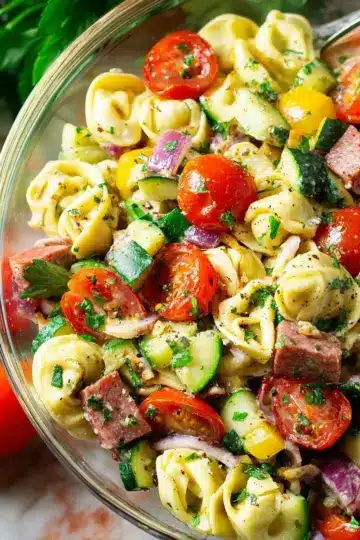 Italian Tortellini Pasta Salad Recipe A 1200x1200 square photo of Italian Tortellini Pasta Salad. 4.8 Stars (48 Reviews) Print
