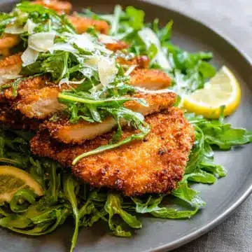 Crusted Chicken Romano Cutlets with Peppery Arugula Salad