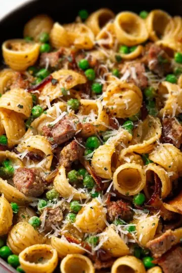Sausage Pesto Pasta with Caramelized Onions and Peas